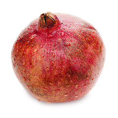 Image showing Ripe pomegranate fruit isolated on white background. Closeup.