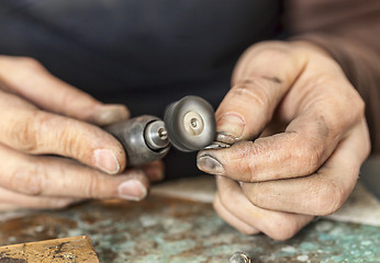 Image showing Hands of a Jeweller