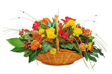 Image showing Flower bouquet arrangement centerpiece in a wicker gift basket i