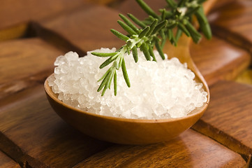 Image showing sea salt with rosemary on a wooden spoon