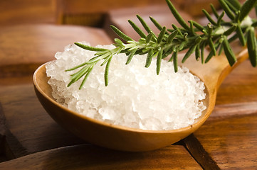 Image showing sea salt with rosemary on a wooden spoon