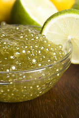 Image showing tapioca pearls with lime. white bubble tea ingredients