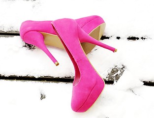 Image showing Pink shoes in snow