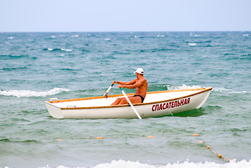 Image showing The rescuer in a boat