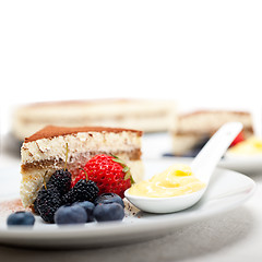 Image showing tiramisu dessert with berries and cream