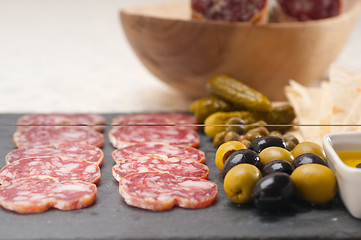 Image showing cold cut platter with pita bread and pickles