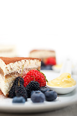 Image showing tiramisu dessert with berries and cream