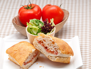 Image showing ciabatta panini sandwich with parma ham and tomato