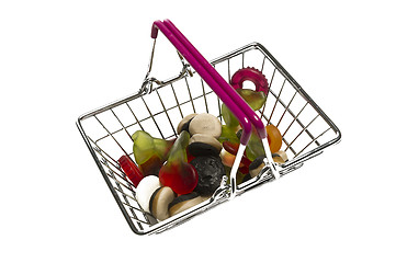 Image showing Shopping cart with colorful candy