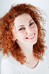 Image showing attractive young redhead woman smiling portrait