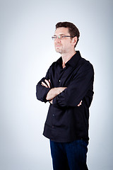 Image showing attractive adult man with glasses and black shirt