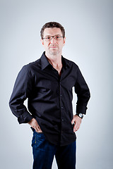 Image showing attractive adult man with glasses and black shirt