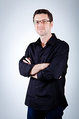 Image showing attractive adult man with glasses and black shirt