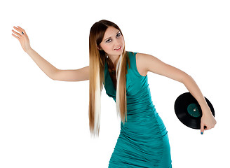 Image showing Attractive woman with vinyl disc