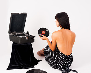 Image showing Pretty woman with gramophone