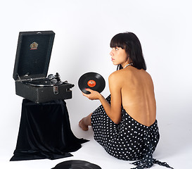 Image showing Pretty woman with gramophone