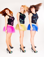 Image showing Three pretty girls dancing