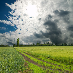 Image showing rural road under dramatic sky