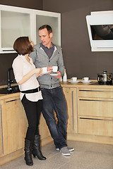 Image showing Young couple enjoying coffee