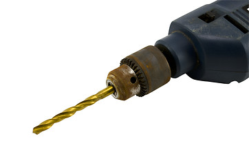 Image showing rusty retro electric drill golden bit closeup 