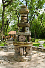 Image showing rural park decor figure retro vintage millstones 