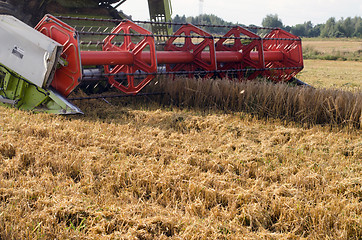 Image showing closeup combine harvest wheat agriculture field 