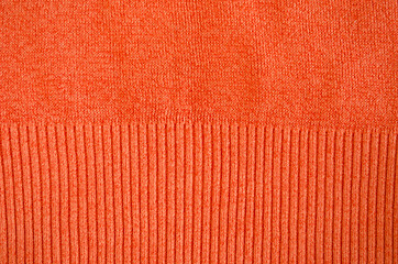 Image showing orange woollen sweater pattern detail backdrop 