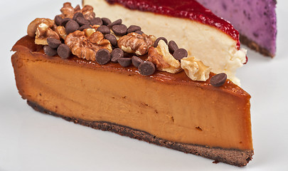 Image showing cheesecake with chocolate and nuts