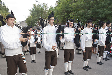 Image showing Spanish folk musicians group playing bagpipes