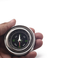 Image showing compass on hand