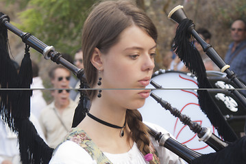 Image showing Spanish folk musicians group playing bagpipes