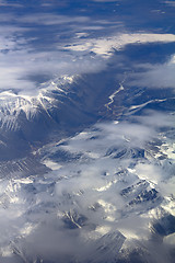 Image showing Pattern of snow, clouds and stones: