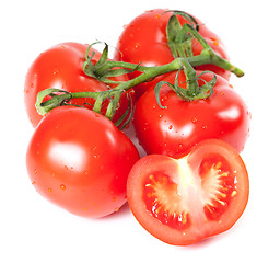 Image showing Bunch of fresh tomatoes with water drops