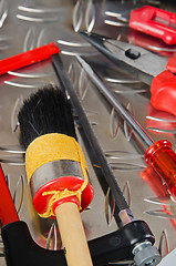 Image showing Set of working tools on a metal surface