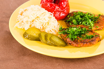 Image showing Stewed meat with vegetables on a garnish