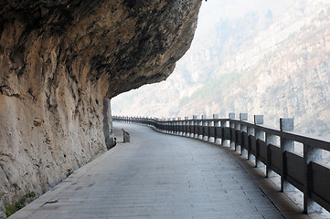 Image showing Highway built under a cliff 