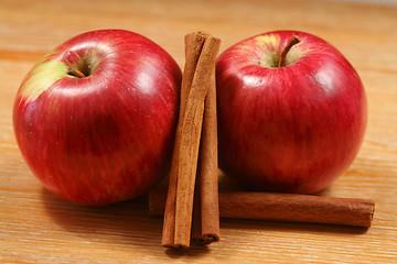 Image showing Two apples with cinnamon