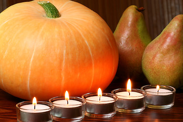 Image showing Cucurbit and pears in fire light