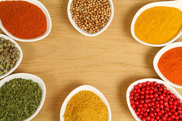 Image showing Spices in ceramic containers