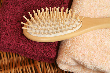 Image showing Hairbrush and towels