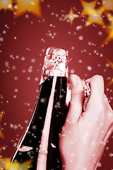 Image showing Opening champagne bottle