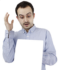 Image showing Man holding a paper