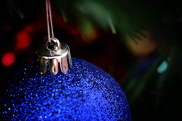 Image showing Christmas ornaments on tree.