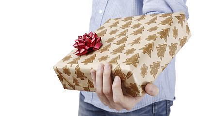 Image showing Young man holding a present