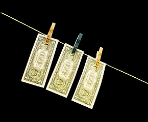 Image showing Dollars on the wire