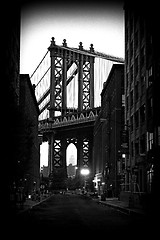 Image showing Brooklyn Bridge and Manhattan Skyline At Night NYC