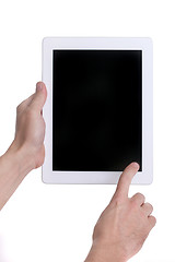 Image showing Hands Holding and Using a Tablet Touch Computer Gadget