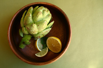 Image showing Artichoke in Wooden Bowl With Lemons