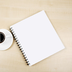 Image showing White cup and white page