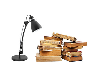Image showing old books with a lamp